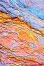 Colourful sedimentary rocks formed by the accumulation of sediments Ã¢â¬â natural rock layers backgrounds, patterns and textures - Royalty Free Stock Photo